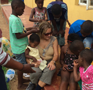 Dana with a group of children in Accra